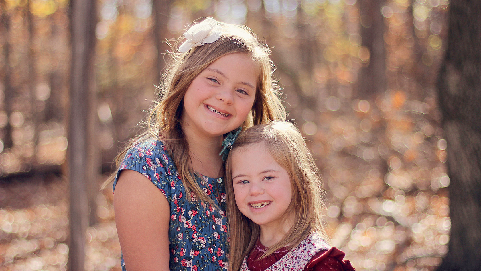 Two smiling sisters