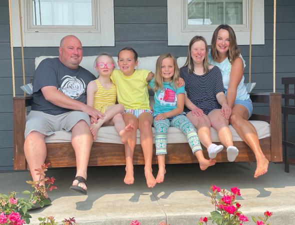 family photo with loved one with down syndrome
